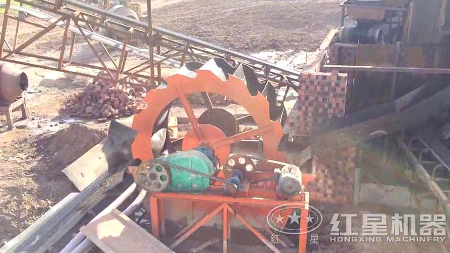 時(shí)產(chǎn)100噸輪斗式洗砂機(jī)工作視頻